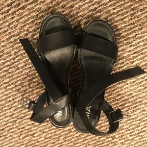 Black leather heals with brown bottoms